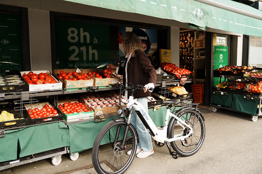Woman on daily errands with Onesport OT05 in European city