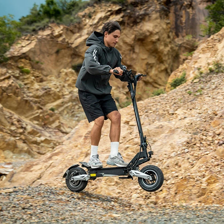 OOTD T10 electric scooter on a mixed-surface outdoor route